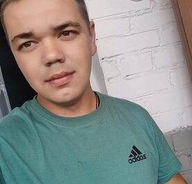 Николай
